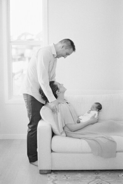 Mom and daughters, snuggling baby bump, photographed by Edmonton Maternity Photographer, Kahla Kristen