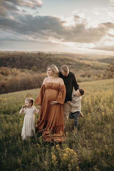 wildflower field with family maternity
