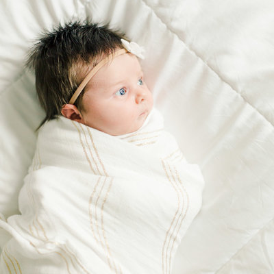 film photography newborn baby girl rochester minnesota newborn photography white simple lifestyle portraits