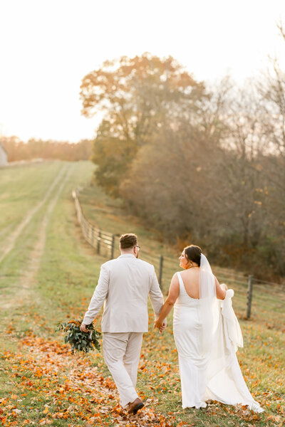 bride and groom kissing on their wedding day at Rivercrest Farm