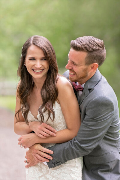 couple laughing wedding photography in oshkosh