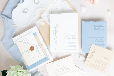 Gray and white wedding reception place setting