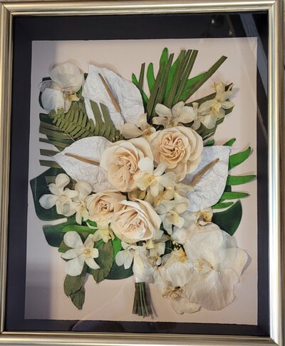 Elegant pressed floral arrangement showcasing timeless flower preservation techniques by Leigh Florist.