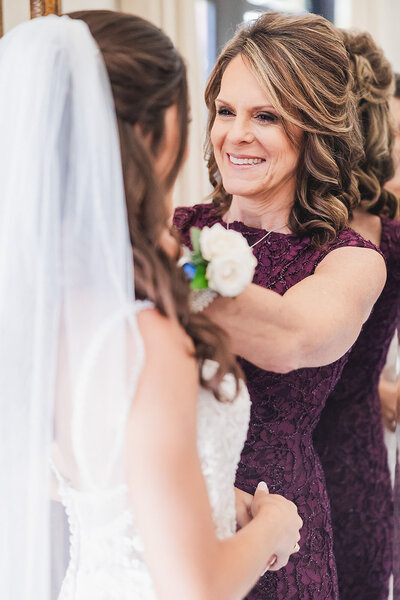 Bride and mother share a special moment at the Ma Maison wedding venue in Dripping Springs, Texas.