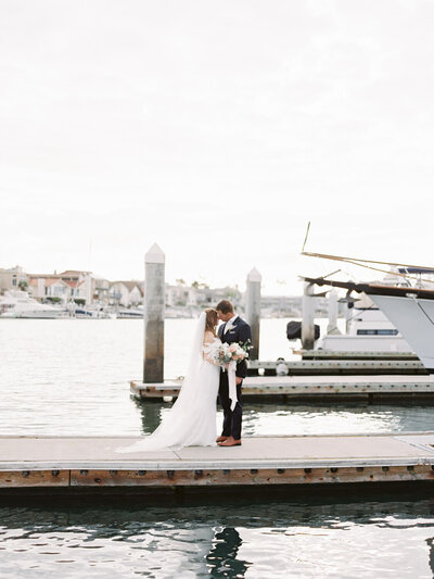 Bride and Groom at a harbor wedding at Loews Coronado - Jacqueline Benét