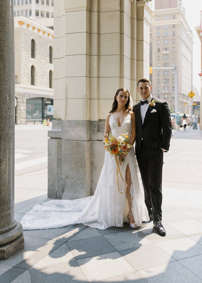 Wedding couple posing in downtown Calgary