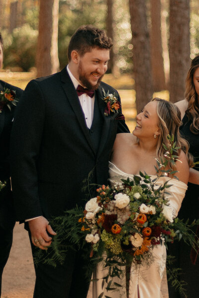 Bride and groom on wedding day at Forever 5 in Magnolia, Texas