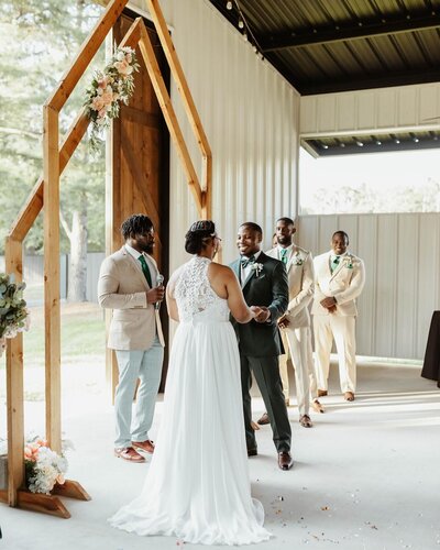 outdoor wedding at rosewood venue mt vernon east texas wedding bride and groom during ceremony