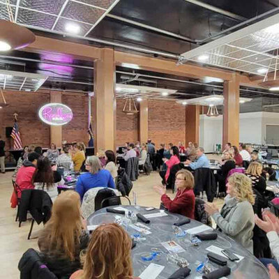 Conference with people at tables and chairs in great falls, mt