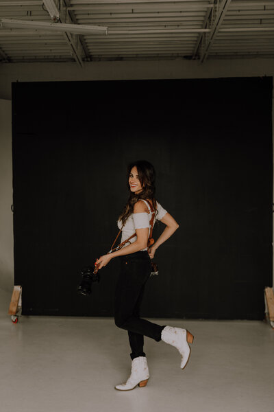colorado photographer in studio with her cameras