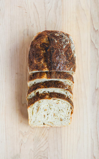 Savory white cheddar sourdough with a hint of sofrito spice.