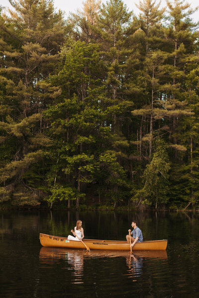 Couple in bathing suits embracing in Lake Dillon CO