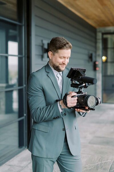 Michael smiling at his camera