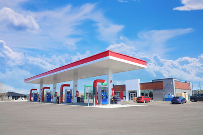red white and blue gas station on a bright sunny day