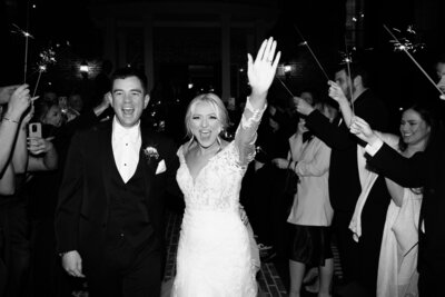 Texas wedding photographer captures joyful bride and groom celebrating at luxury wedding reception