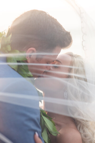 Intimate microwedding at the Hilton Waikoloa Village, capturing a romantic and personalized celebration for the couple surrounded by luxury and natural beauty in Hawaii.