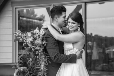 Haiku I Do wedding photography groom whispering in bride's ear Asheville, NC