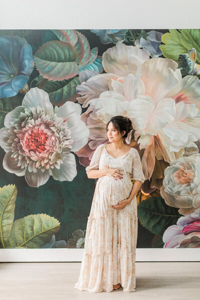 pregnant mother in studio by maternity photographer in Orlando