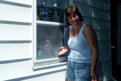 Young Megan's Drive thru window