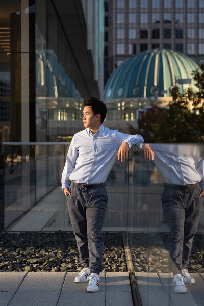 Ben casually posing during golden hour in Dallas for his senior portraits.