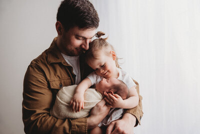 Indianapolis newborn photography - dad and two babies
