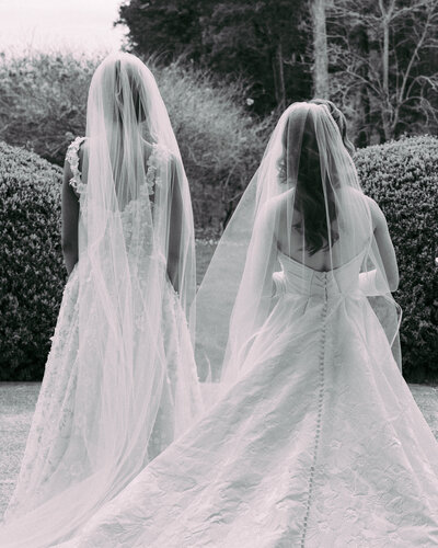 Black and white photo of two brides at the Wadsworth Mansion.