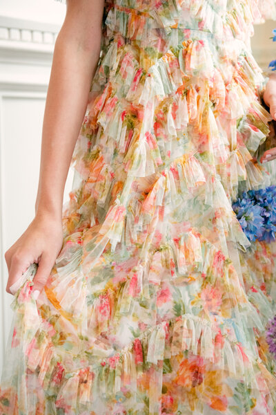 Floral dress with peach and green tones