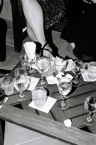 Black and white photo of drink glasses on a table
