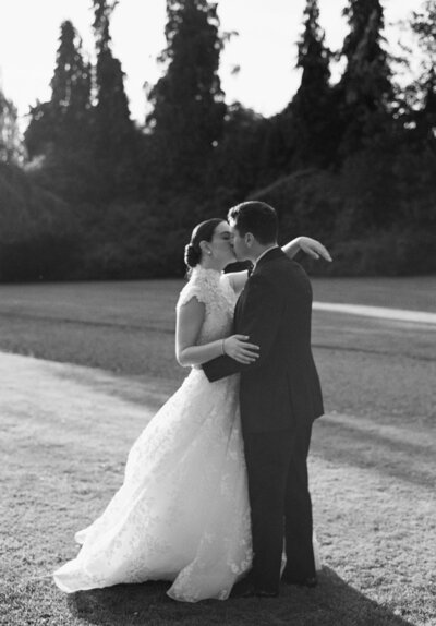 a wedding couple embracing at their wedding in ireland at adare manor