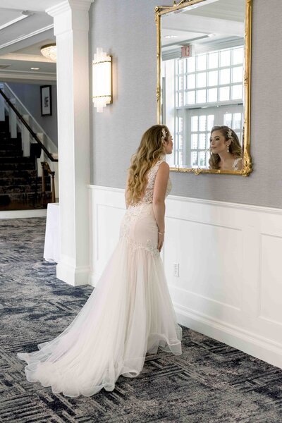 Bride Looking At Reflection