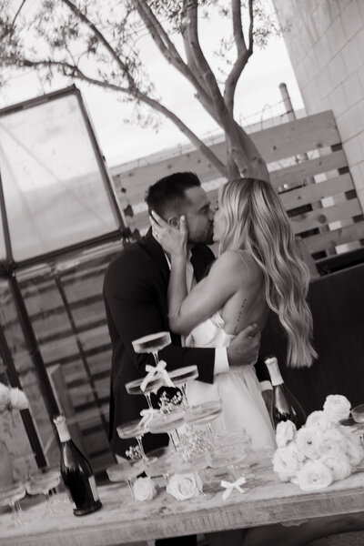 bride and groom holding eachother