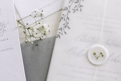 Custom calligraphy wedding invitation in gray ink