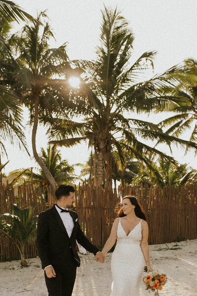 bride and groom on beach