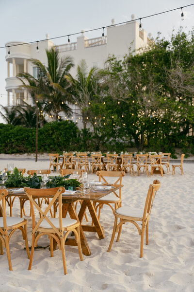 Tropical destination wedding reception details on the beach.