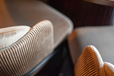 Refined table setting with soft lighting and natural textures inside Revé