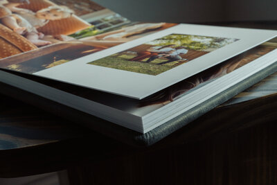 A handcrafted photo album showcasing thick lay-flat pages by JPF Galleries, made for preserving legacy.