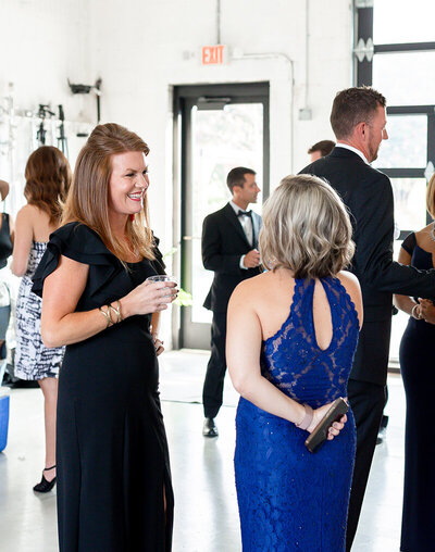 Women socializing at a corporate event