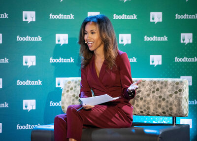 Adrianna Hopkins moderates a fireside chat panel for Foodtank at UDC.