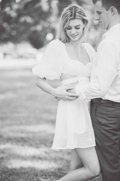 Couple snuggled in during their engagement session in DC