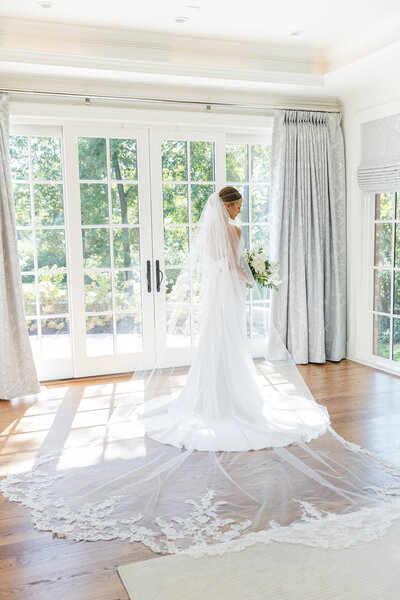 bride getting ready at Emerson Fields Excello Missouri