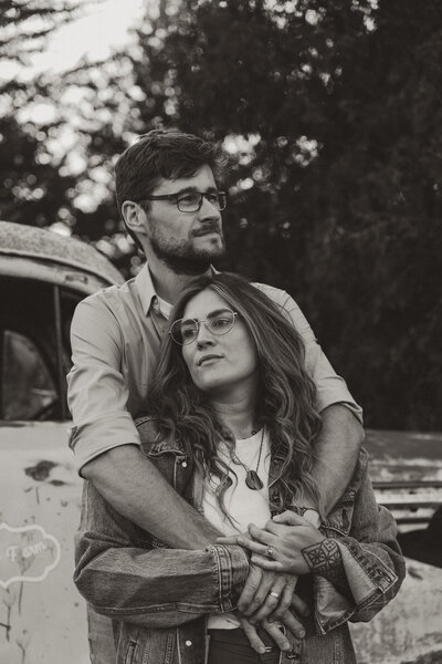 photo of couple leaning on each other