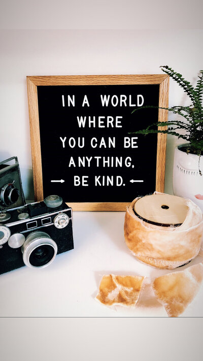 Black letterboard with Be Kind type
