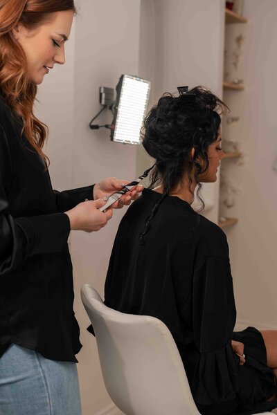 women getting hair styled