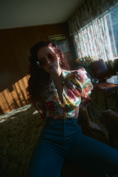 AI generated image of Brie in 70s clothes and background