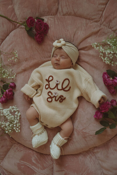 Organic newborn sessions with gentle posing, natural light, and earthy tones to preserve fleeting memories for sentimental parents.