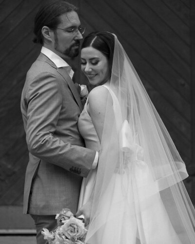 Bride and Groom enjoying a calm moment forehead to forehead