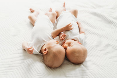 twin newborns sleeping