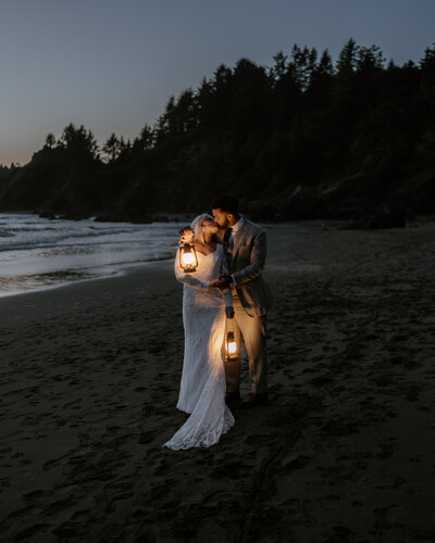 bride and groom with lanterns