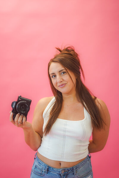 photographer holding camera
