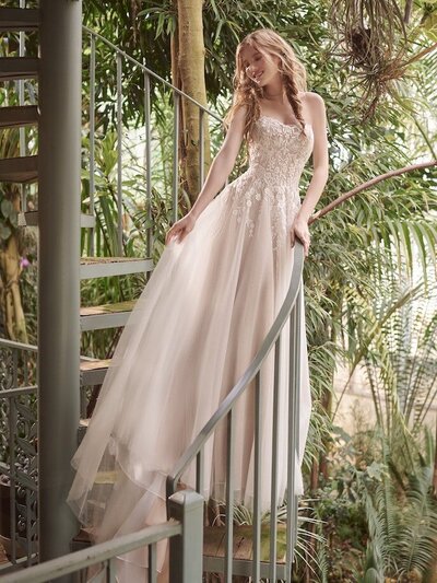Illusion Crepe Sheath Wedding Dress. Looking for sexy but not too sexy? Exposed boning makes a chic and delicate statement in this illusion crepe sheath wedding dress.